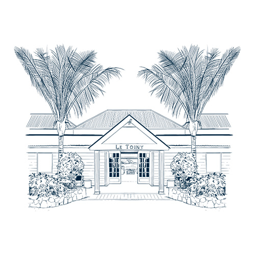 Hôtel Le Toiny — the entrance, framed by palms